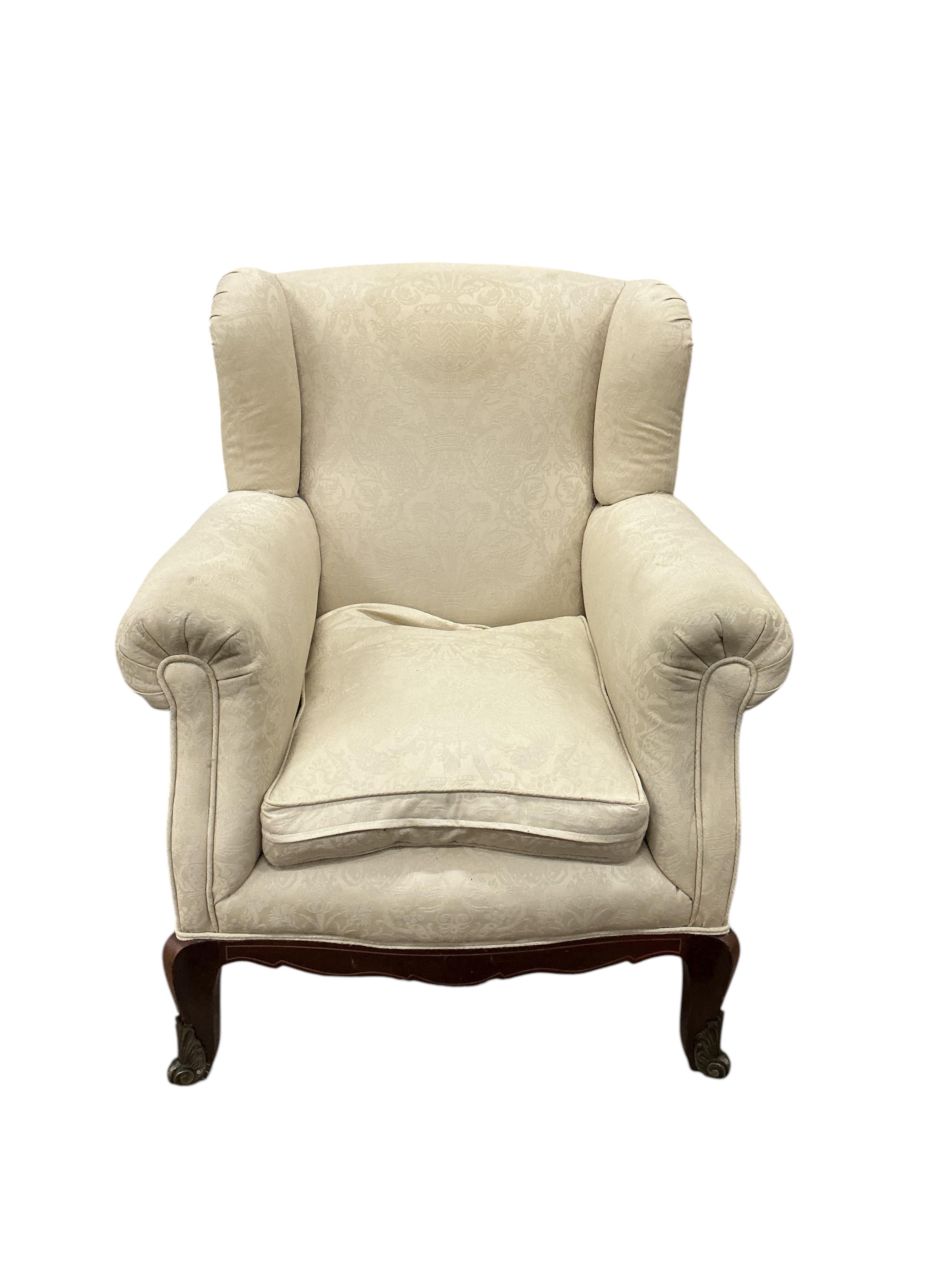 A late 19th century gilt metal mounted upholstered armchair, width 84cm, depth 76cm, height 100cm
